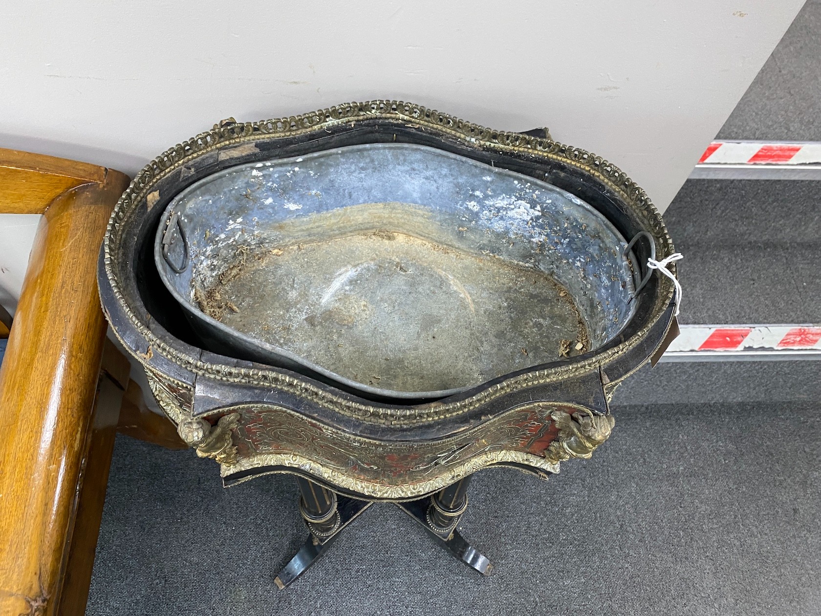 A 19th century boullework jardiniere, now on fluted ebonised stand, width 46cm, depth 33cm, height 90cm